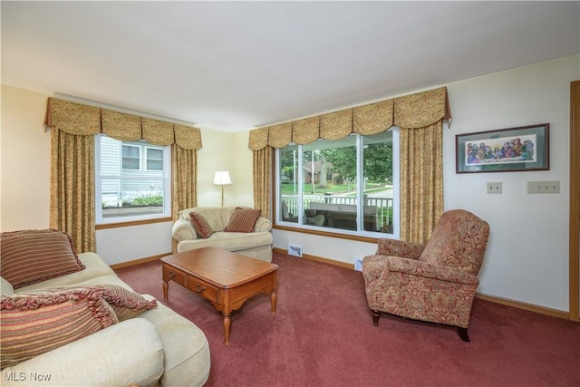 291 S Cleveland Ave, Mogadore, OH 44260 - carpeted living area featuring healthy amount of natural light
