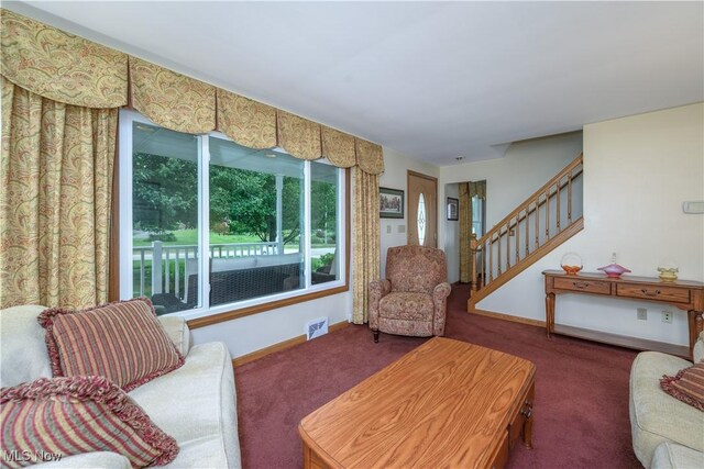 291 S Cleveland Ave, Mogadore, OH 44260 - carpeted living room with baseboards and stairway