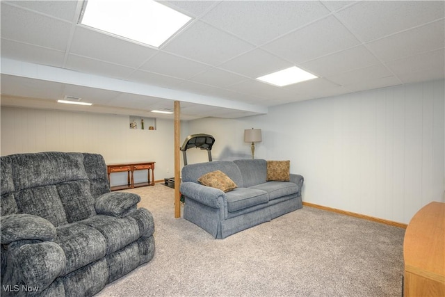 291 S Cleveland Ave, Mogadore, OH 44260 - carpeted living area featuring a paneled ceiling and baseboards