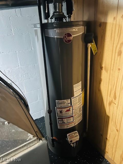 1700 Malasia Rd, Akron, OH 44305 - utility room featuring gas water heater
