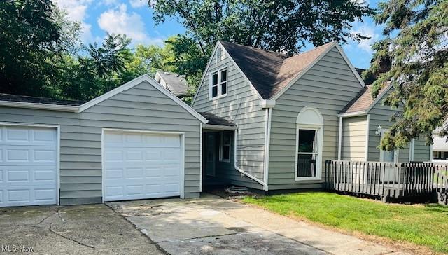1700 Malasia Rd, Akron, OH 44305 - view of front of house featuring concrete driveway and an attached garage