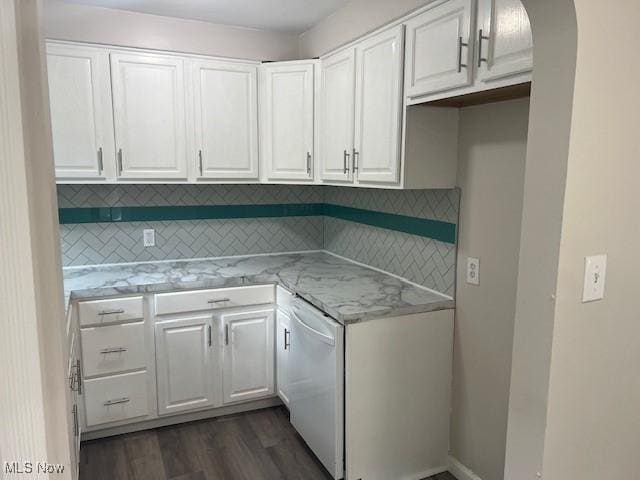1700 Malasia Rd, Akron, OH 44305 - kitchen with dishwasher, white cabinetry, decorative backsplash, light stone countertops, and dark wood-style flooring