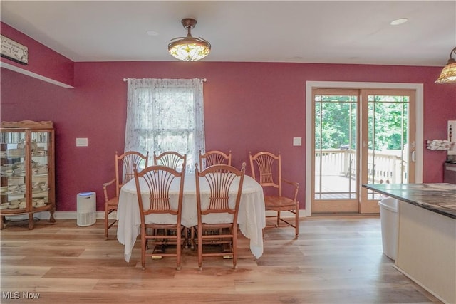 2077 Daniels Ave, Akron, OH 44312 - dining room featuring light wood-type flooring and recessed lighting