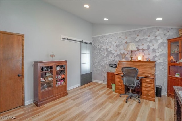 2077 Daniels Ave, Akron, OH 44312 - office with lofted ceiling, a barn door, wood finished floors, and recessed lighting