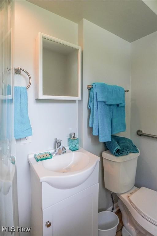 2077 Daniels Ave, Akron, OH 44312 - bathroom featuring toilet and vanity