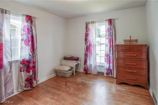 2077 Daniels Ave, Akron, OH 44312 - bedroom with light wood-style flooring and baseboards