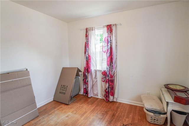 2077 Daniels Ave, Akron, OH 44312 - bedroom with light wood finished floors and baseboards