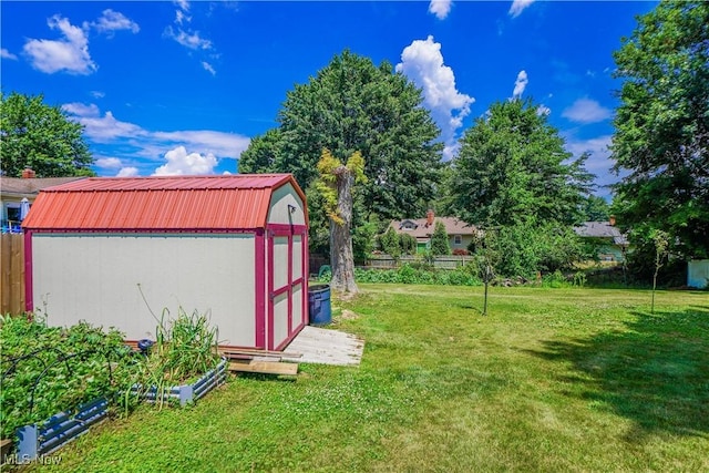 2077 Daniels Ave, Akron, OH 44312 - view of yard featuring a storage unit