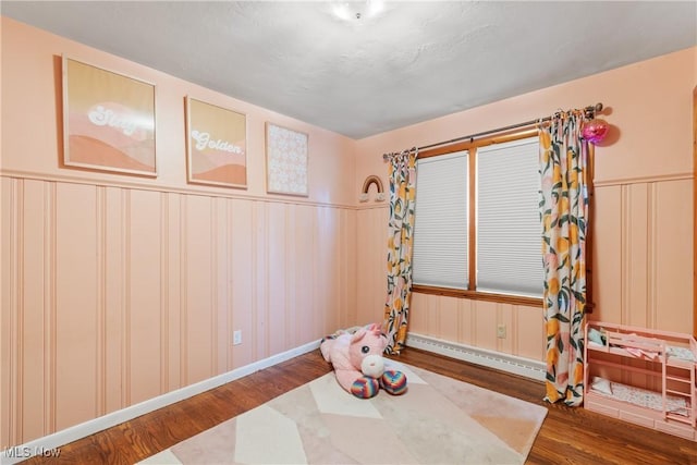 1332 Broadview Ave, Akron, OH 44321 - spare room with wood finished floors, a wainscoted wall, and a decorative wall