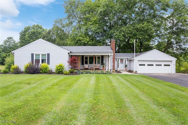 1332 Broadview Ave, Akron, OH 44321 - single story home featuring a porch, driveway, a chimney, and a front yard