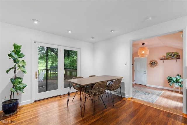 1332 Broadview Ave, Akron, OH 44321 - dining space featuring wood finished floors, recessed lighting, and vaulted ceiling