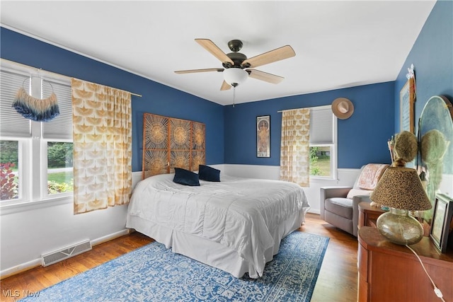 1332 Broadview Ave, Akron, OH 44321 - bedroom featuring wood finished floors and ceiling fan