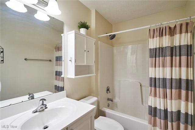 full bathroom with vanity and shower / tub combo