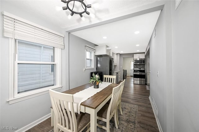908 Dawnwood Dr, Parma, OH 44134 - dining room with dark wood-style flooring and recessed lighting