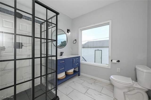 908 Dawnwood Dr, Parma, OH 44134 - bathroom with vanity, marble look tile flooring, and tiled shower