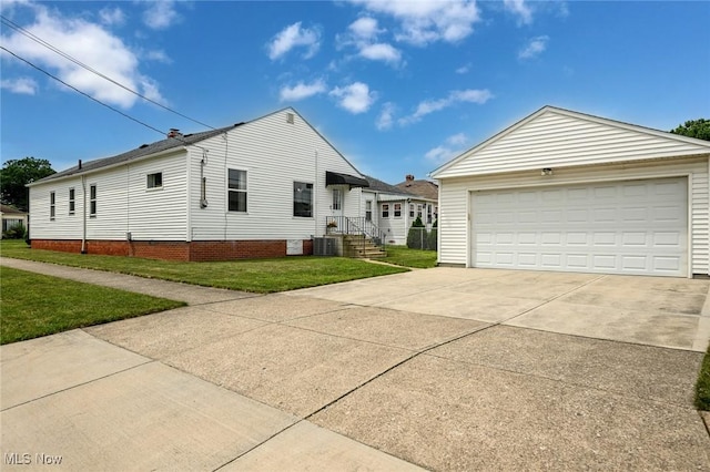 908 Dawnwood Dr, Parma, OH 44134 - view of side of property with a yard and a garage