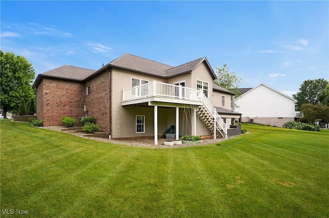 5461 Brook Run Ave NE, Louisville, OH 44641 - rear view of house featuring stairs, a deck, a yard, and brick siding