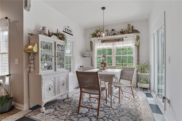 5461 Brook Run Ave NE, Louisville, OH 44641 - dining area featuring healthy amount of natural light