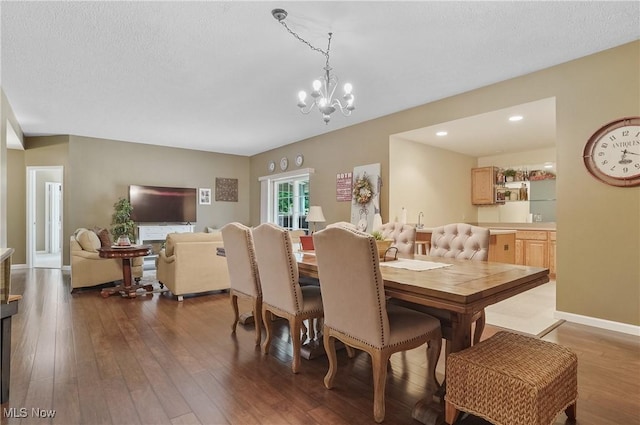 5461 Brook Run Ave NE, Louisville, OH 44641 - dining area featuring wood-type flooring, a chandelier, and recessed lighting