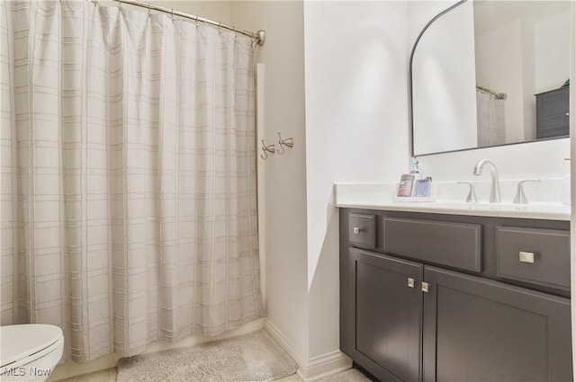 5461 Brook Run Ave NE, Louisville, OH 44641 - bathroom with vanity and curtained shower