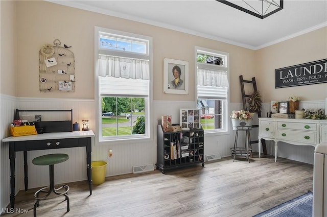 5461 Brook Run Ave NE, Louisville, OH 44641 - home office with wainscoting, wood finished floors, and crown molding
