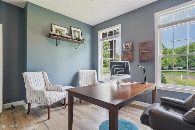 5461 Brook Run Ave NE, Louisville, OH 44641 - home office with baseboards and wood finished floors