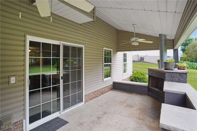 5461 Brook Run Ave NE, Louisville, OH 44641 - view of patio / terrace featuring ceiling fan
