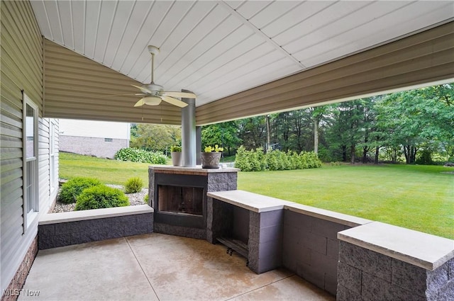 5461 Brook Run Ave NE, Louisville, OH 44641 - view of patio featuring exterior fireplace and ceiling fan