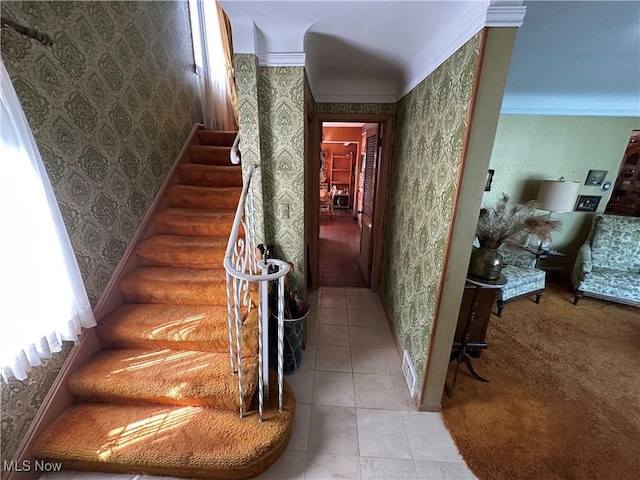 130 E 199th St, Euclid, OH 44119 - staircase featuring wallpapered walls and tile patterned floors