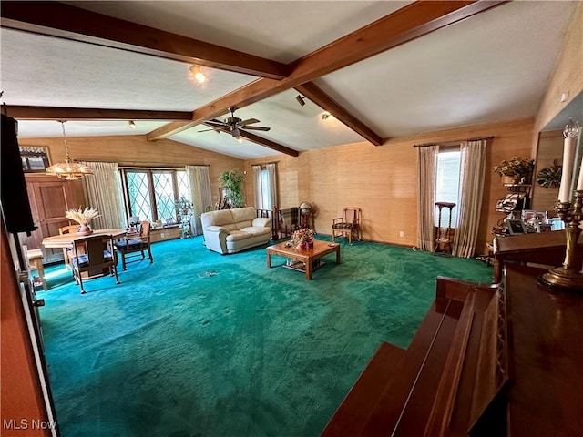 130 E 199th St, Euclid, OH 44119 - carpeted living room with healthy amount of natural light, ceiling fan, and a chandelier