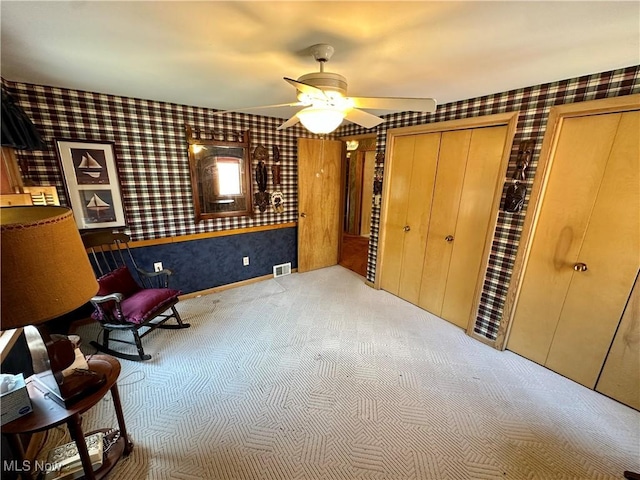 130 E 199th St, Euclid, OH 44119 - sitting room featuring wallpapered walls, carpet floors, and a ceiling fan