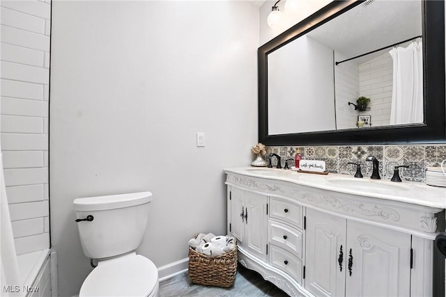 1293 Redtail Hawk Dr Unit 4, Boardman, OH 44512 - full bathroom featuring double vanity, wood finished floors, and shower / tub combo