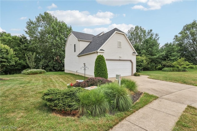 957 Devonwood Dr, Wadsworth, OH 44281 - view of side of home with concrete driveway, a lawn, a garage, and roof with shingles