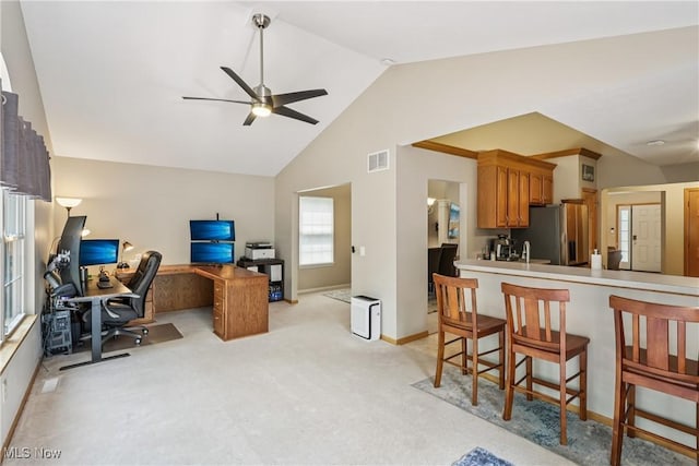 957 Devonwood Dr, Wadsworth, OH 44281 - home office featuring light colored carpet, ceiling fan, and vaulted ceiling