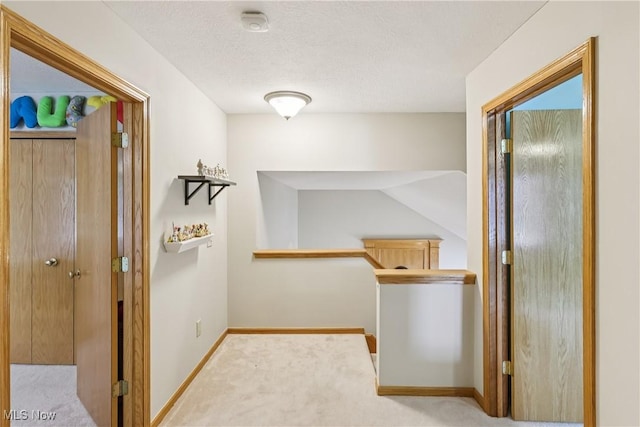 957 Devonwood Dr, Wadsworth, OH 44281 - corridor featuring an upstairs landing and carpet