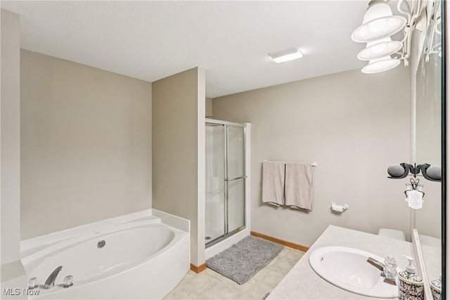 957 Devonwood Dr, Wadsworth, OH 44281 - bathroom featuring a shower stall, a garden tub, and vanity