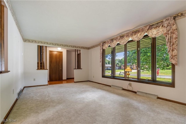 5200 Tanglewood Ave NE, Louisville, OH 44641 - spare room with carpet and baseboards