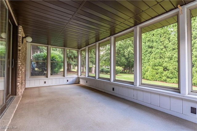 5200 Tanglewood Ave NE, Louisville, OH 44641 - unfurnished sunroom with healthy amount of natural light