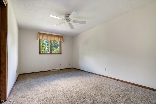 5200 Tanglewood Ave NE, Louisville, OH 44641 - carpeted empty room featuring ceiling fan and baseboards