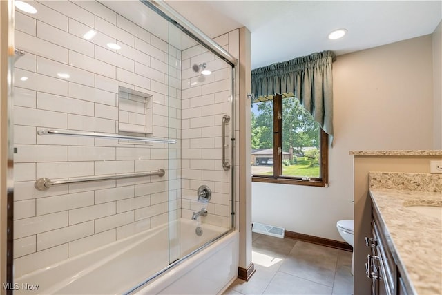 5200 Tanglewood Ave NE, Louisville, OH 44641 - bathroom featuring vanity, tile patterned flooring, shower / bath combination with glass door, and recessed lighting
