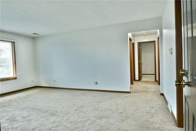 894 Pearson Cir Unit 3, Boardman, OH 44512 - unfurnished room featuring light colored carpet and baseboards