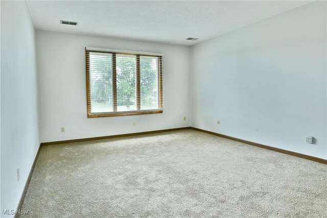 894 Pearson Cir Unit 3, Boardman, OH 44512 - spare room with carpet floors and baseboards