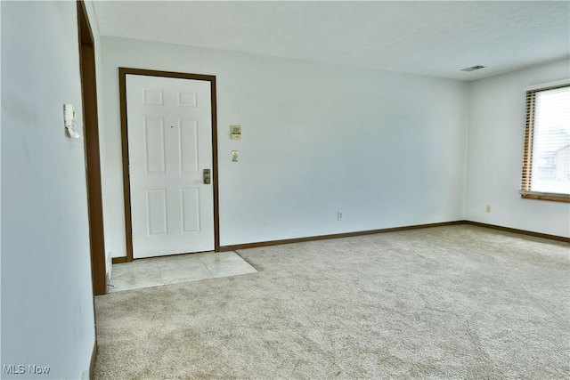 894 Pearson Cir Unit 3, Boardman, OH 44512 - spare room featuring carpet floors and baseboards