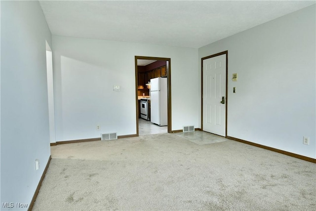 894 Pearson Cir Unit 3, Boardman, OH 44512 - unfurnished room featuring light carpet and baseboards