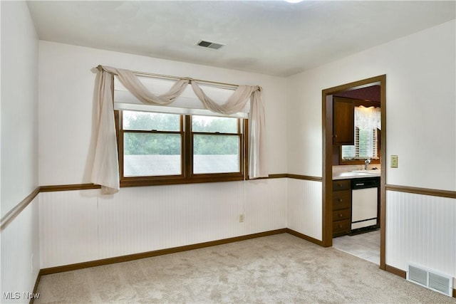 894 Pearson Cir Unit 3, Boardman, OH 44512 - unfurnished room featuring a sink and light carpet