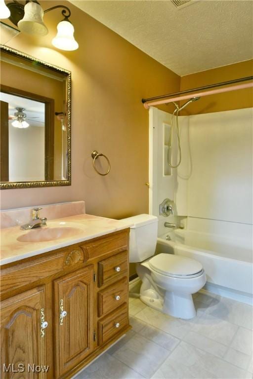 894 Pearson Cir Unit 3, Boardman, OH 44512 - bathroom featuring vanity, shower / bath combination, tile patterned floors, and a textured ceiling