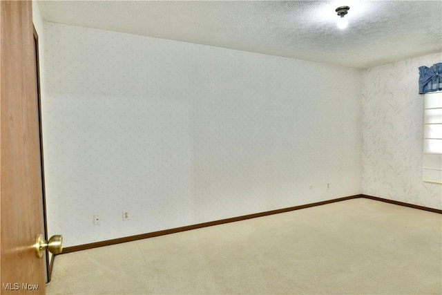 894 Pearson Cir Unit 3, Boardman, OH 44512 - carpeted spare room with a textured ceiling