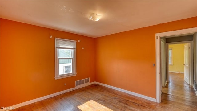 60 S Liberty St, New Concord, OH 43762 - unfurnished room featuring hardwood / wood-style floors and baseboards