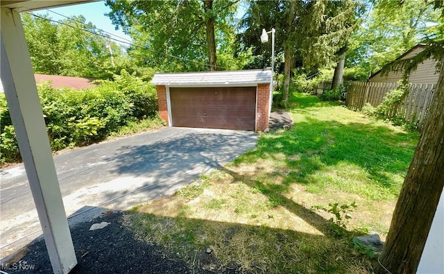 16721 Lomond Blvd, Shaker Heights, OH 44120 - view of yard with an outdoor structure and a garage