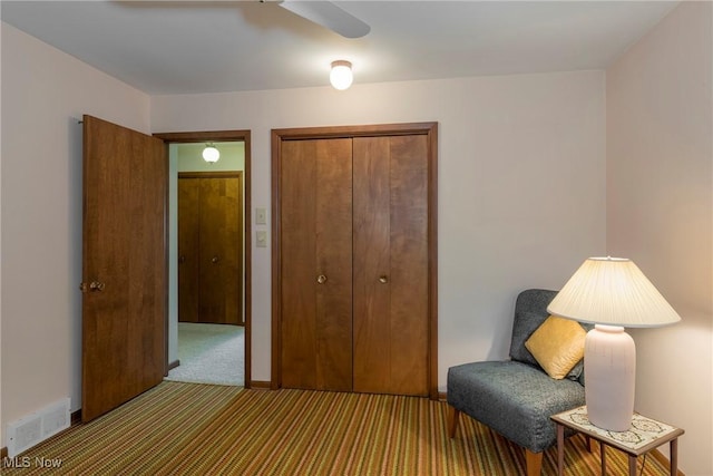 7080 Arcadia Dr, Parma, OH 44129 - living area featuring carpet floors and a ceiling fan